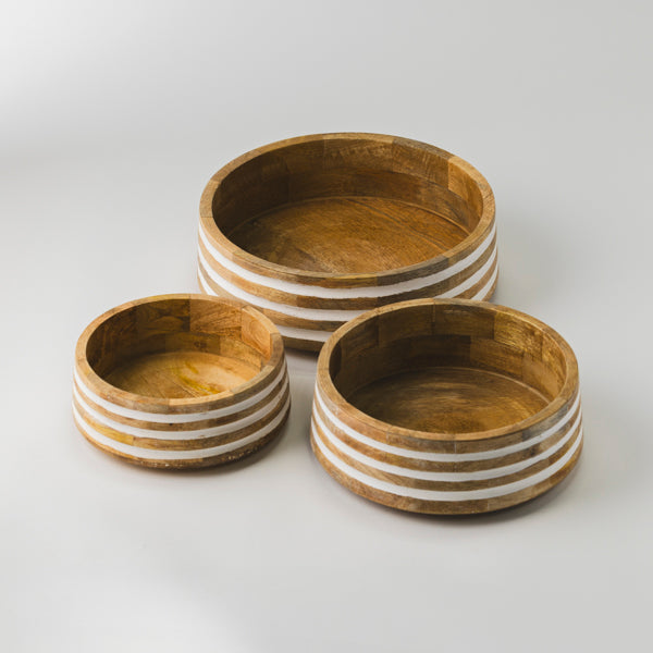 Whitehaven set of 3 mango wood nested serving bowls with hand-applied white pinstripe detailing.