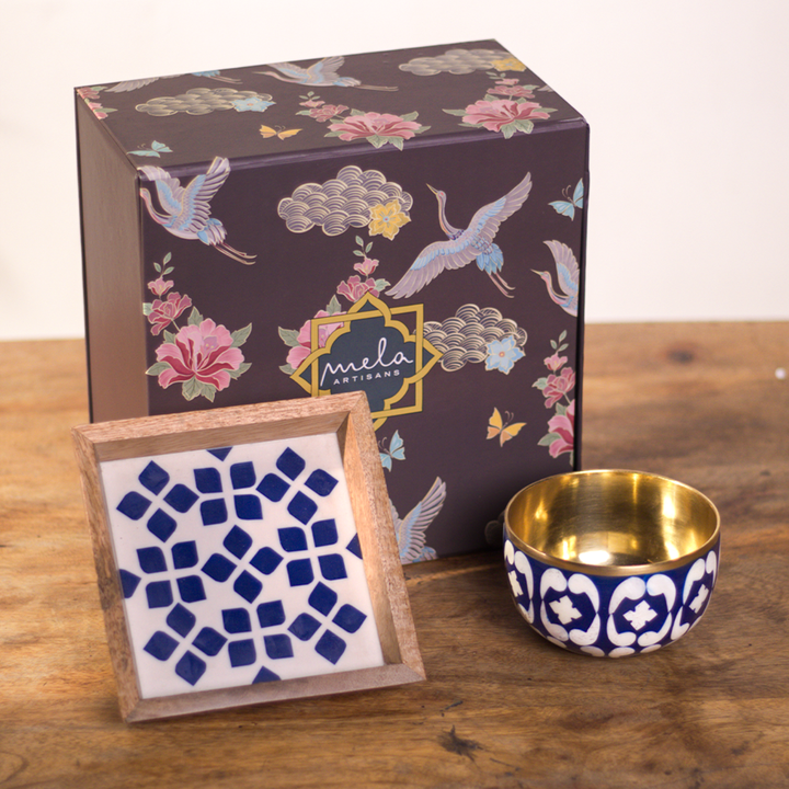 Blue lattice patterned trinket bowl and tray set displayed together
