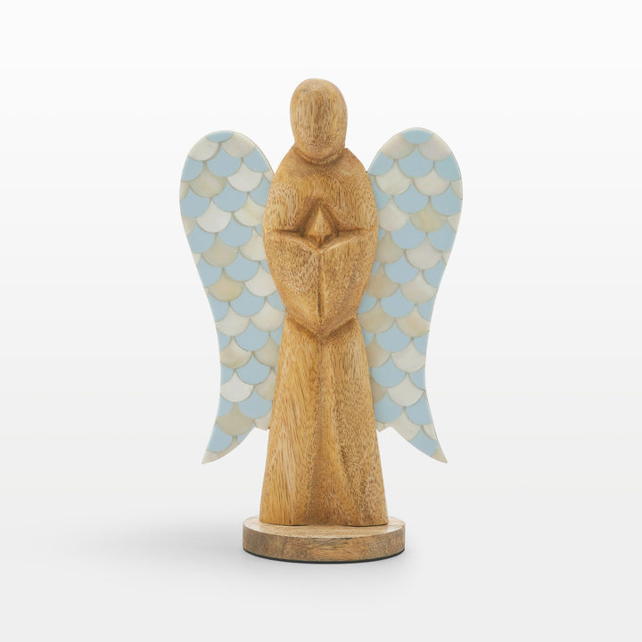Close-up of hand-carved wooden angel body and scalloped teal and white bone inlay wing pattern