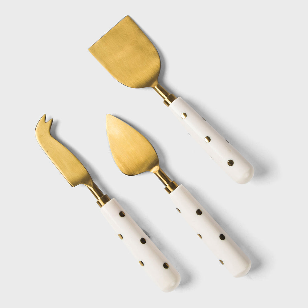Sitara cheese server set with ivory handles and brass detailing
