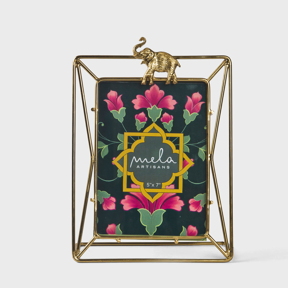 Gold wireframe 5x7 photo frame featuring a detailed miniature elephant accent on top