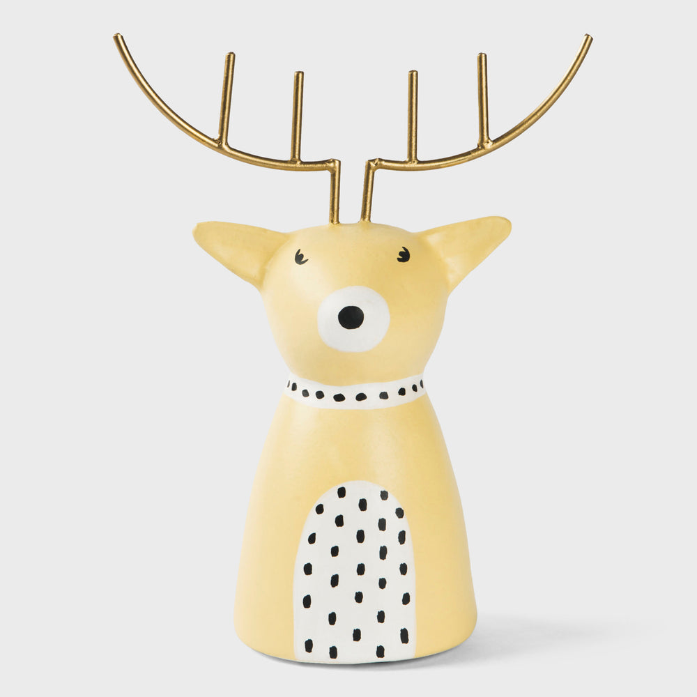 Ivory papier-mâché reindeer figurine with golden antlers