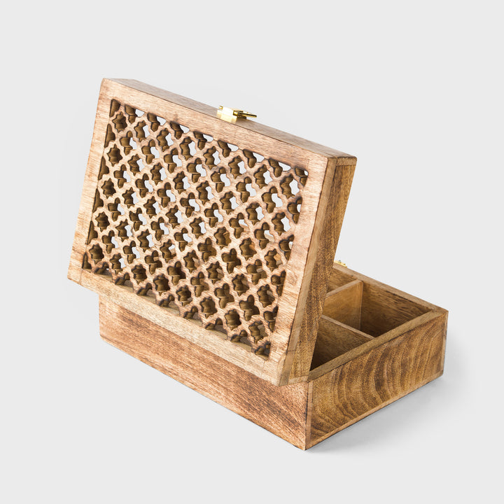 close-up of geometric trellis carving and medium burnt finish on mango wood keepsake box