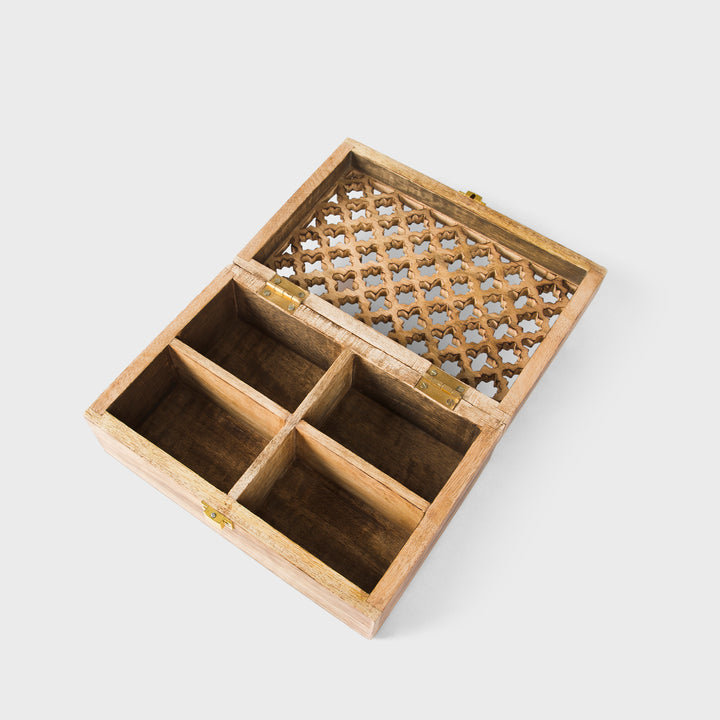 close-up of geometric trellis carving and medium burnt finish on mango wood keepsake box