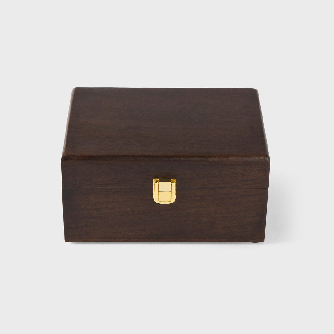 close-up of urban walnut finish and metal latch on acacia wood keepsake box
