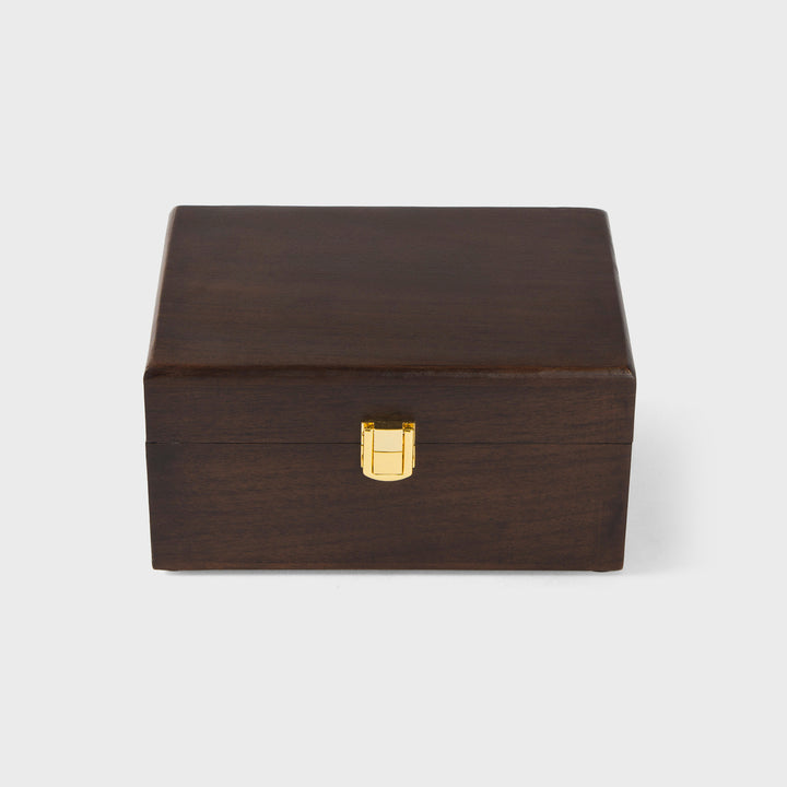 close-up of urban walnut finish and metal latch on acacia wood keepsake box
