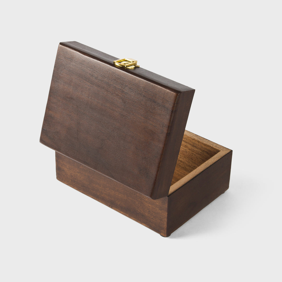 close-up of urban walnut finish and metal latch on acacia wood keepsake box
