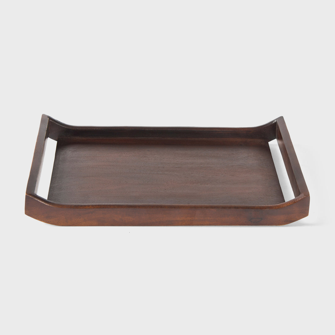 Close-up of urban walnut acacia wood grain and curved handle design on serving tray