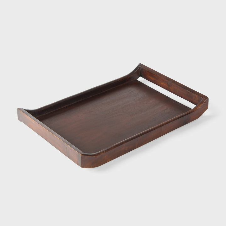 Close-up of urban walnut acacia wood grain and curved handle design on serving tray
