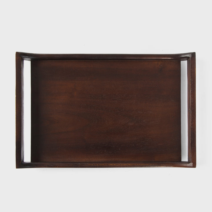 Close-up of urban walnut acacia wood grain and curved handle design on serving tray