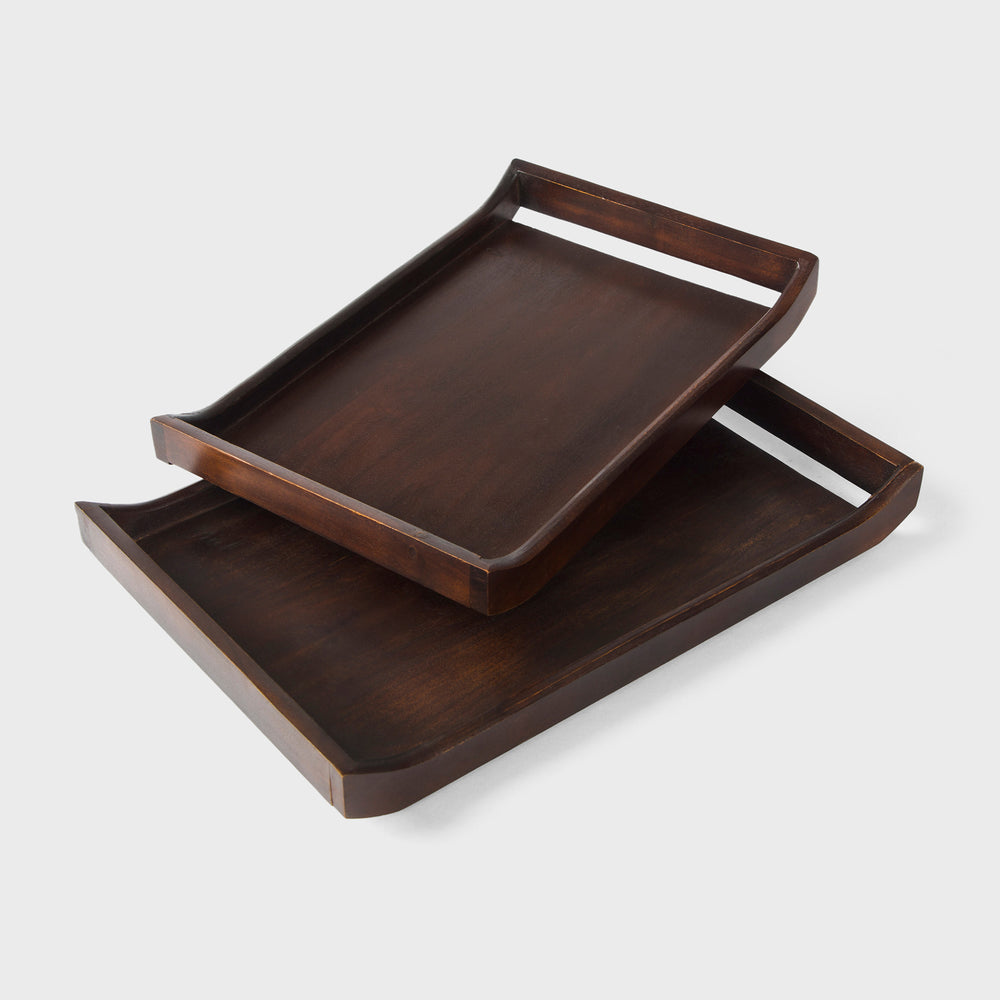 Set of two acacia wood serving trays in urban walnut finish with integrated handles