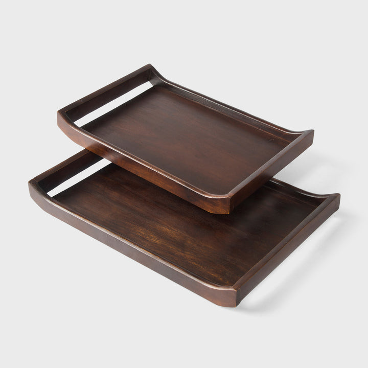 Set of two acacia wood serving trays in urban walnut finish with integrated handles