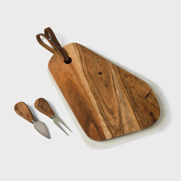 white marble and acacia wood cutting board set by mela artisans
