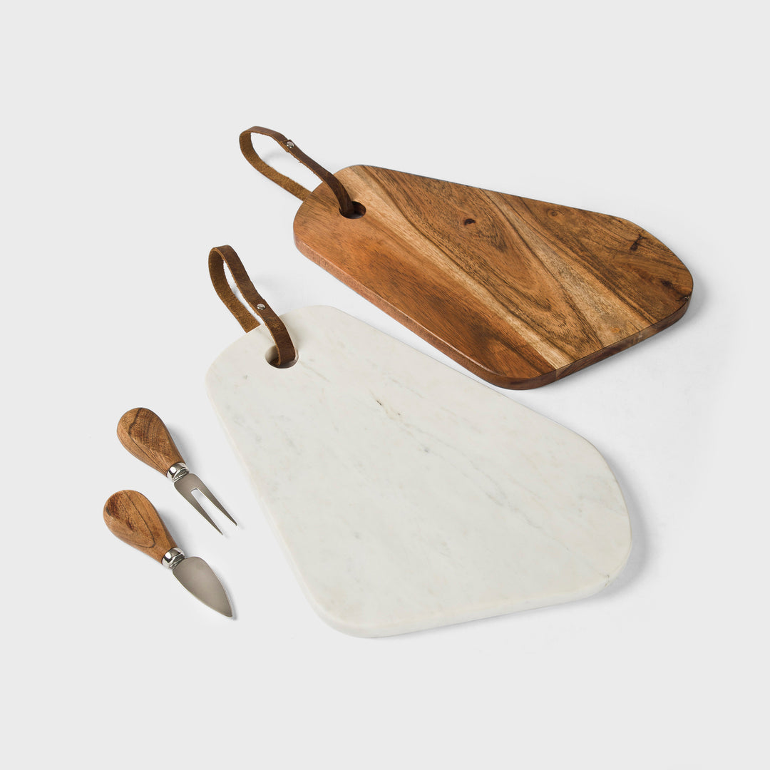 white marble and acacia wood cutting board set by mela artisans