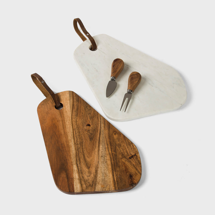 white marble and acacia wood cutting board set by mela artisans