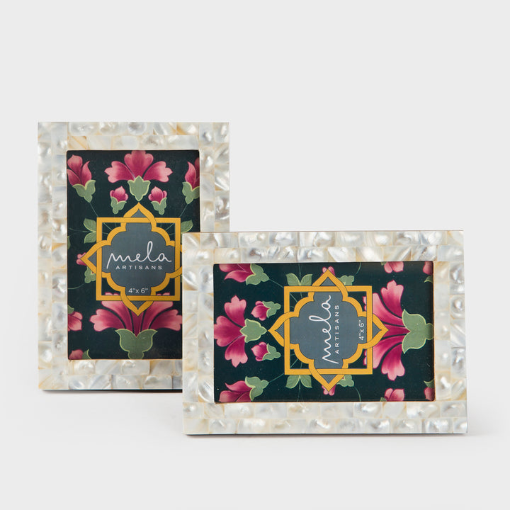 Set of two handcrafted mother of pearl inlay photo frames in white and silver holding 4x6 photos