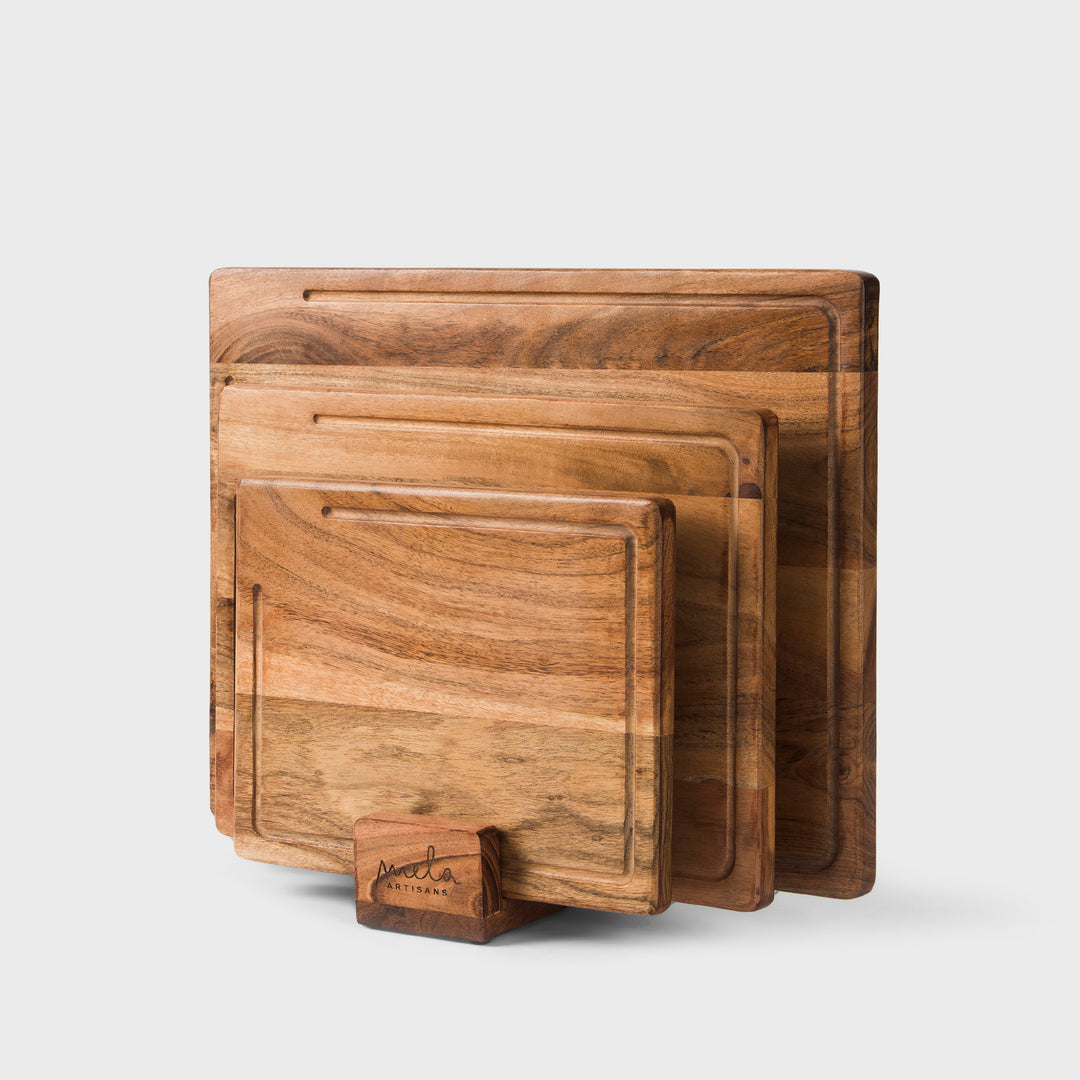 three piece acacia wood cutting board set with stand by mela artisans