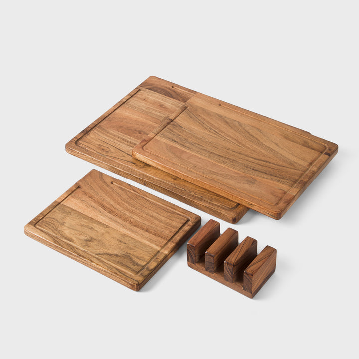 close-up of natural acacia wood grain on handcrafted cutting boards with storage stand