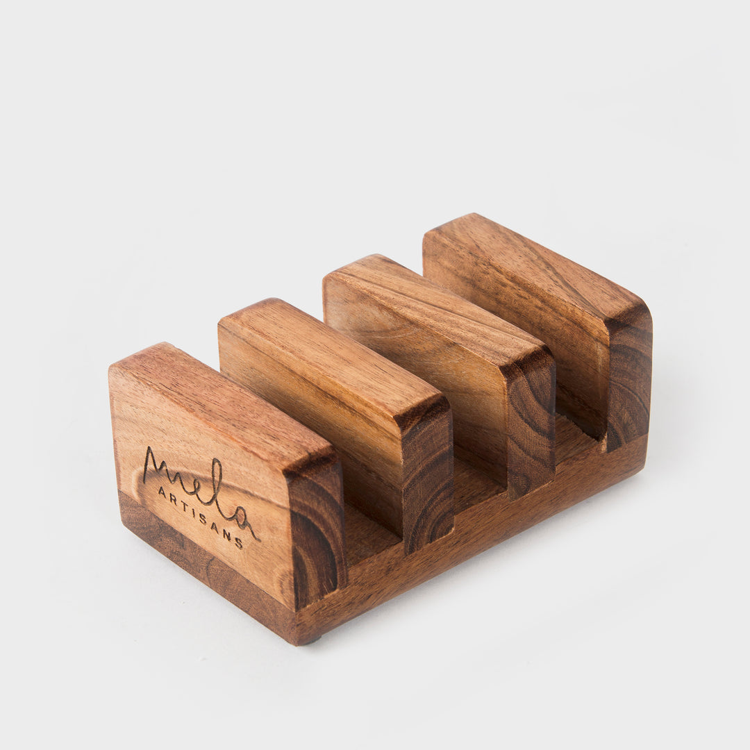close-up of natural acacia wood grain on handcrafted cutting boards with storage stand