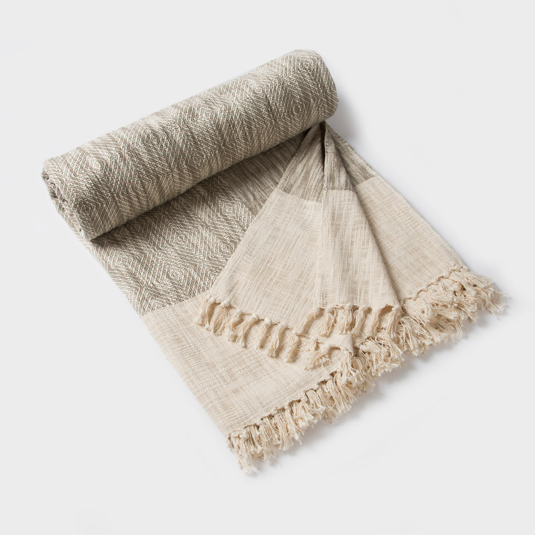Earthy Brown reversible cotton bed cover in single size displayed on bed