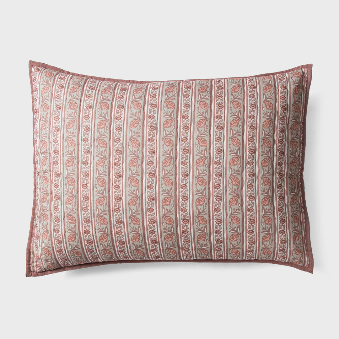 Close-up of blush pink standard printed pattern and cotton fabric texture