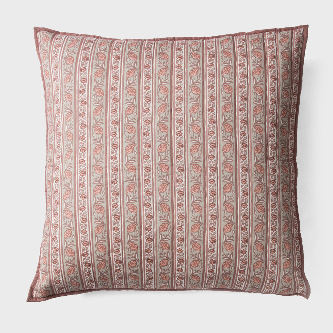 Close-up of blush pink euro printed pattern and cotton fabric texture