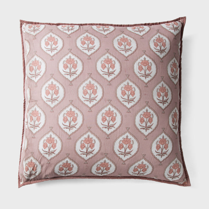 Close-up of blush pink euro printed pattern and cotton fabric texture