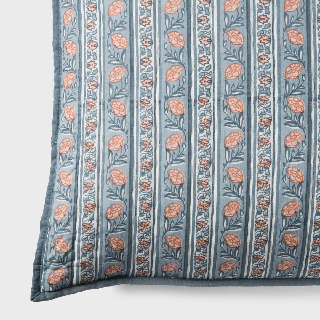 Close-up of blue block printed pattern and cotton fabric texture