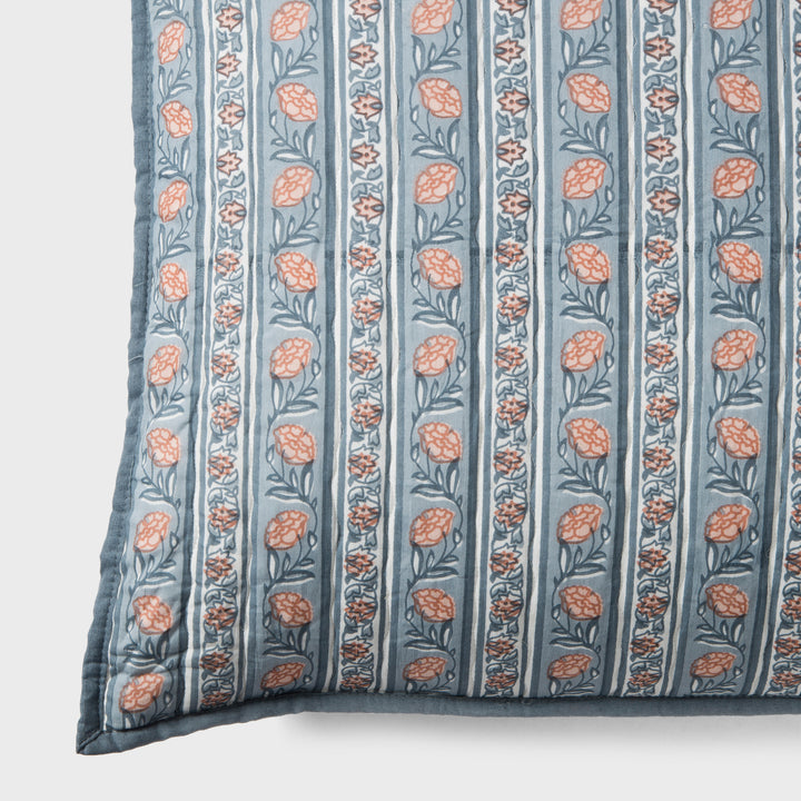 Close-up of blue block printed pattern and cotton fabric texture