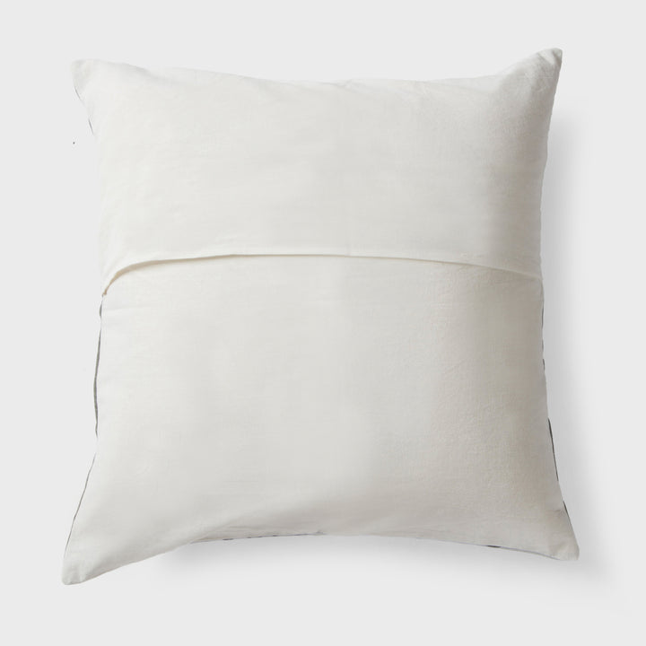 Close-up of printed floral pattern on cotton cushion cover