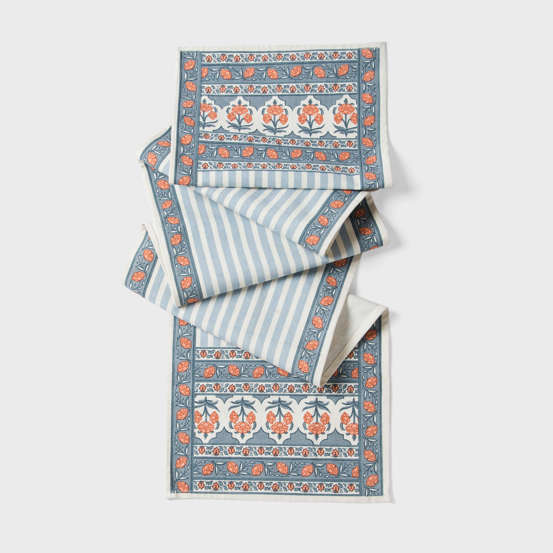 Printed cotton table runner in blue floral stripes

