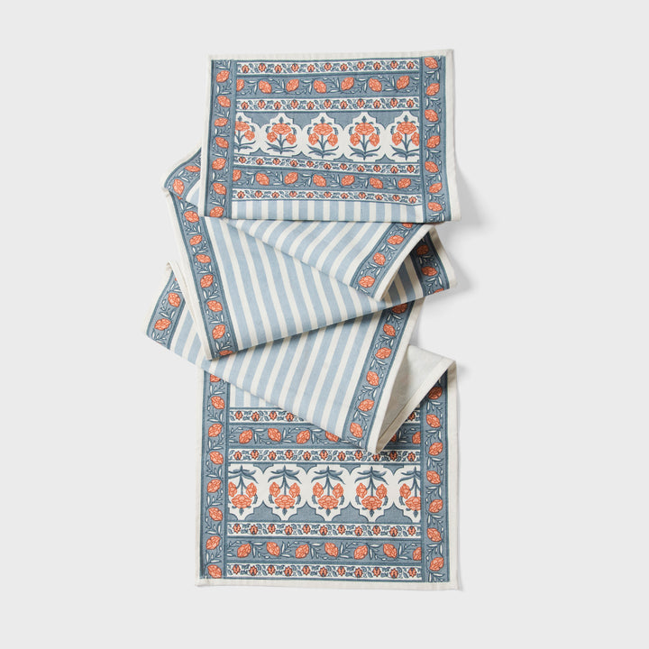 Printed cotton table runner in blue floral stripes
