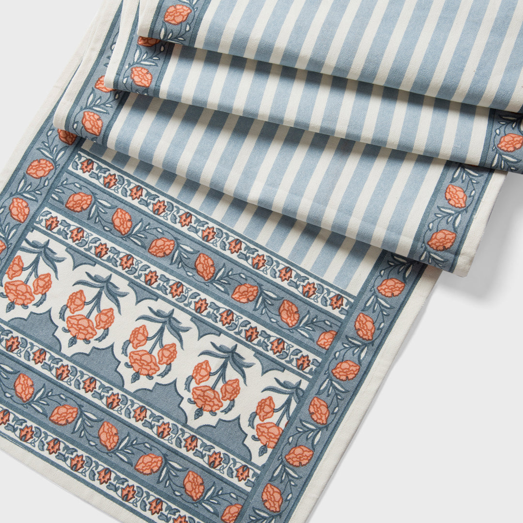 Printed cotton table runner in blue floral stripes
