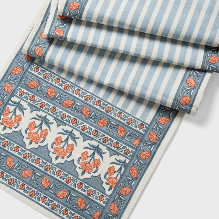 Printed cotton table runner in blue floral stripes
