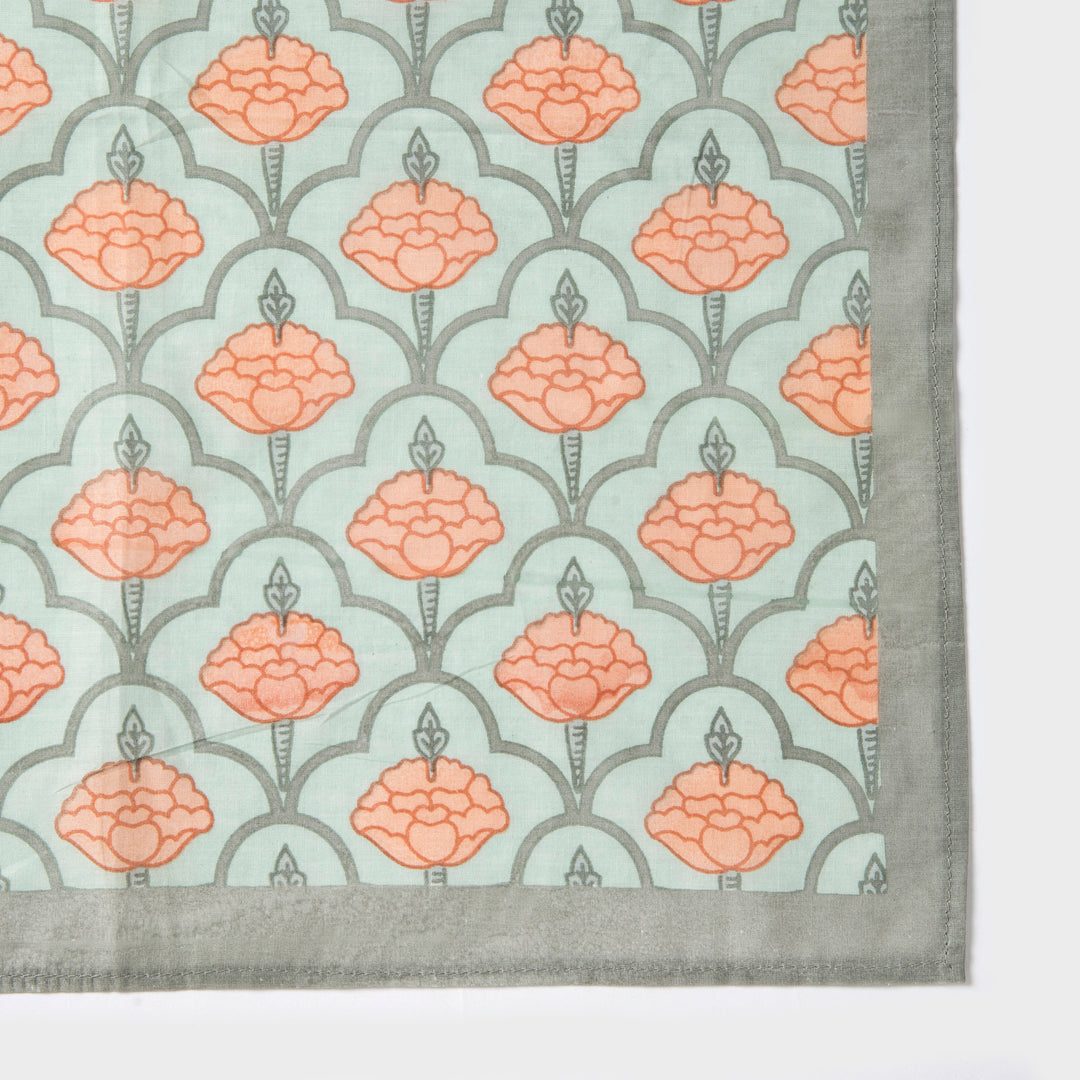 Close-up of ornate floral print on cotton fabric