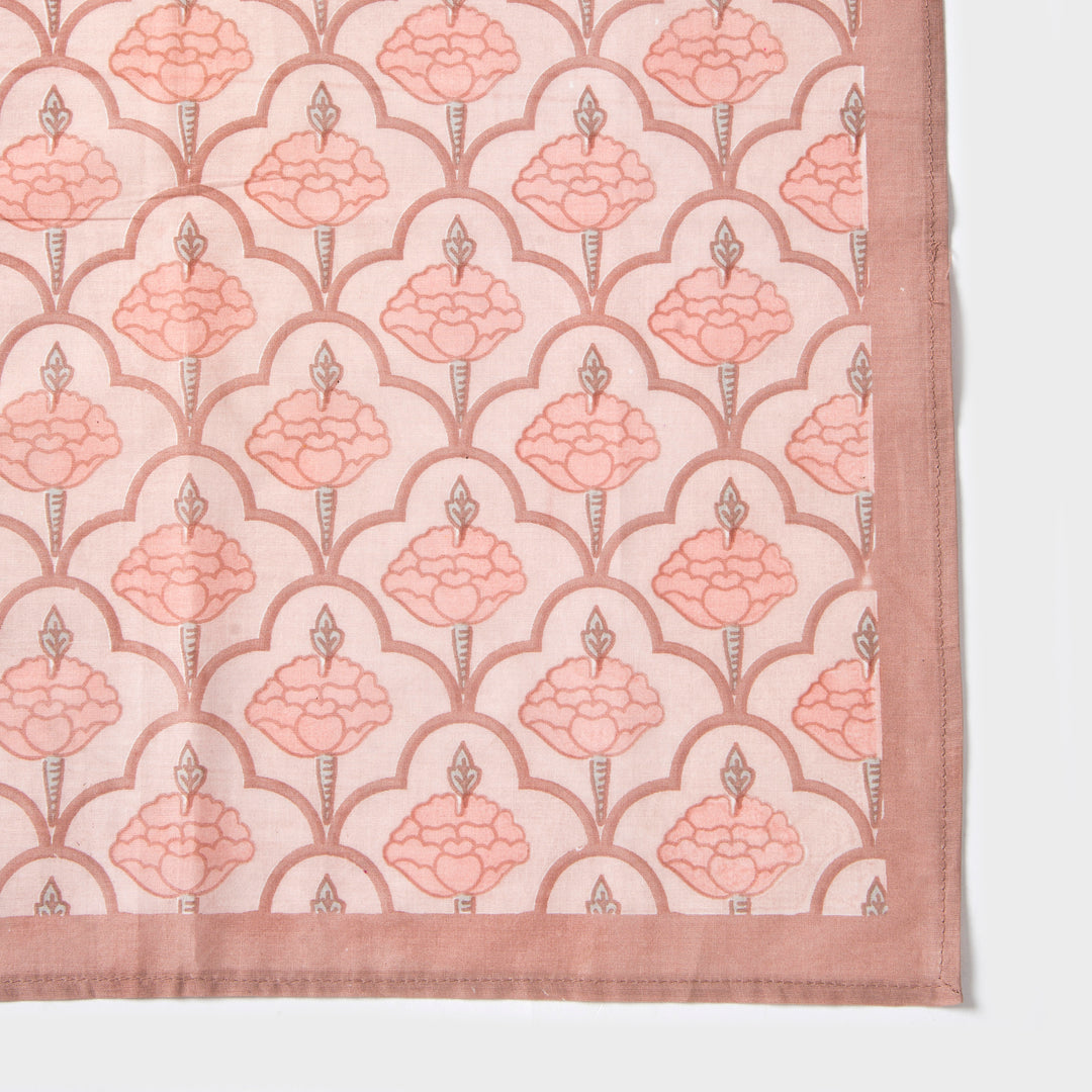 Close-up of ornate floral print on cotton fabric