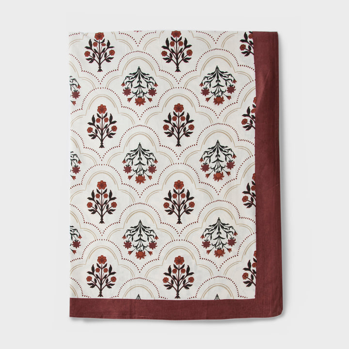 Close-up of ornate floral print on cotton fabric