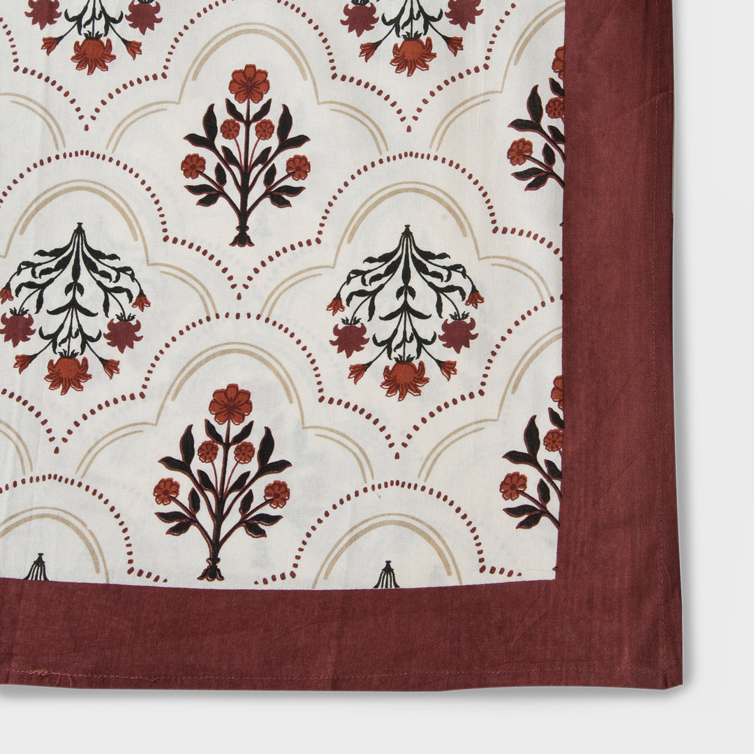 Close-up of ornate floral print on cotton fabric