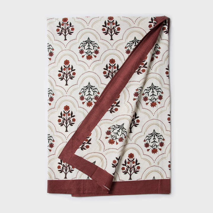 Close-up of ornate floral print on cotton fabric