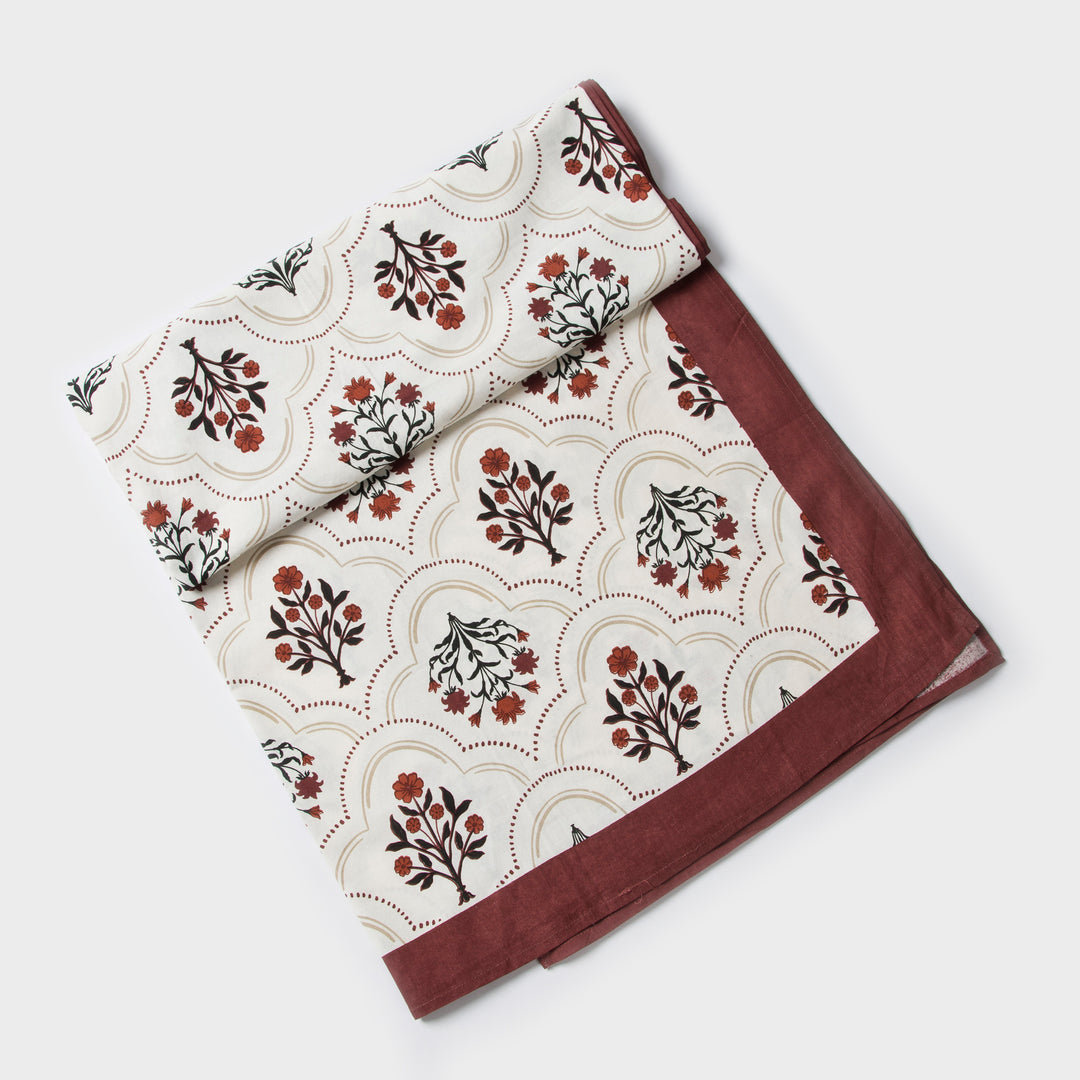 Close-up of ornate floral print on cotton fabric