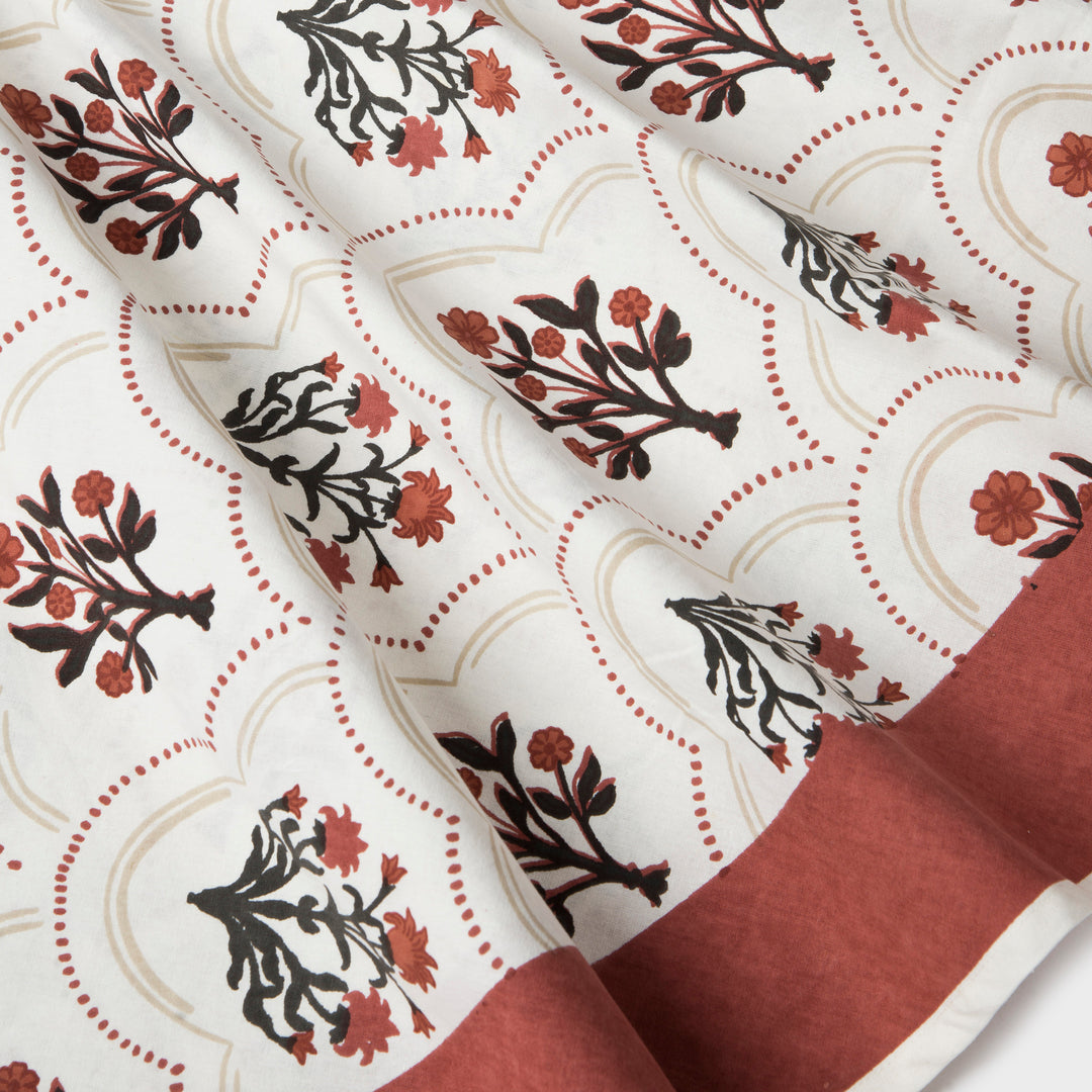 Close-up of ornate floral print on cotton fabric