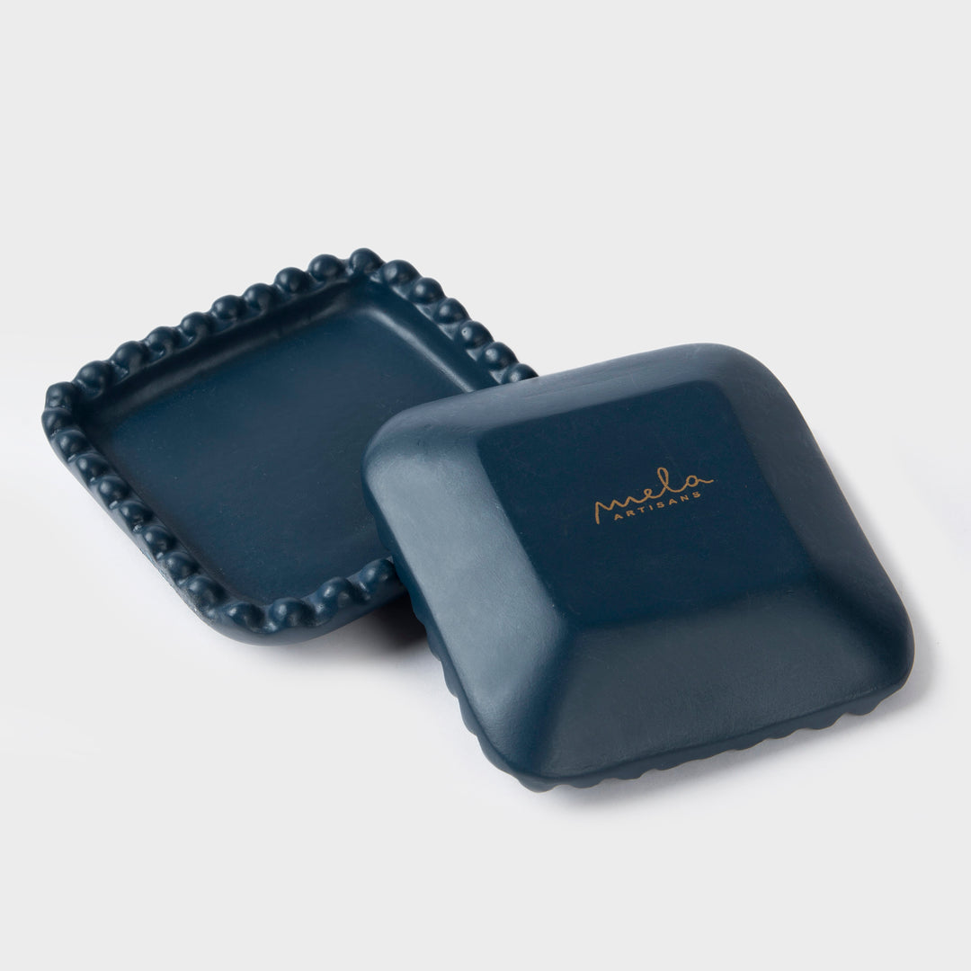 Indigo beaded terracotta trays styled on dresser holding jewelry and small accessories