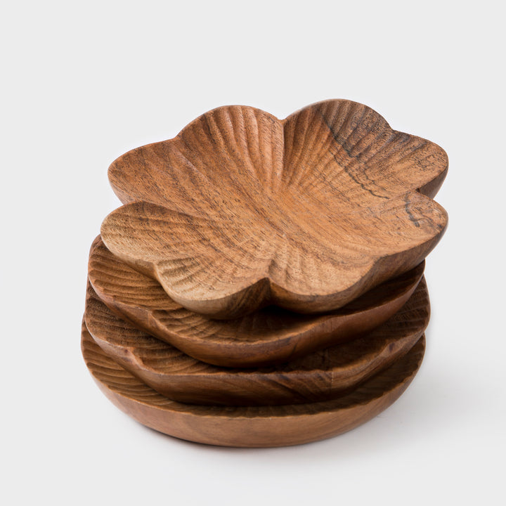  Set of four handcrafted wooden trinket trays in assorted carved shapes