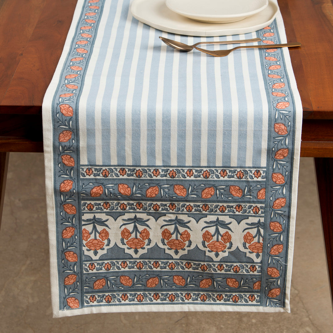 Printed cotton table runner in blue floral stripes
