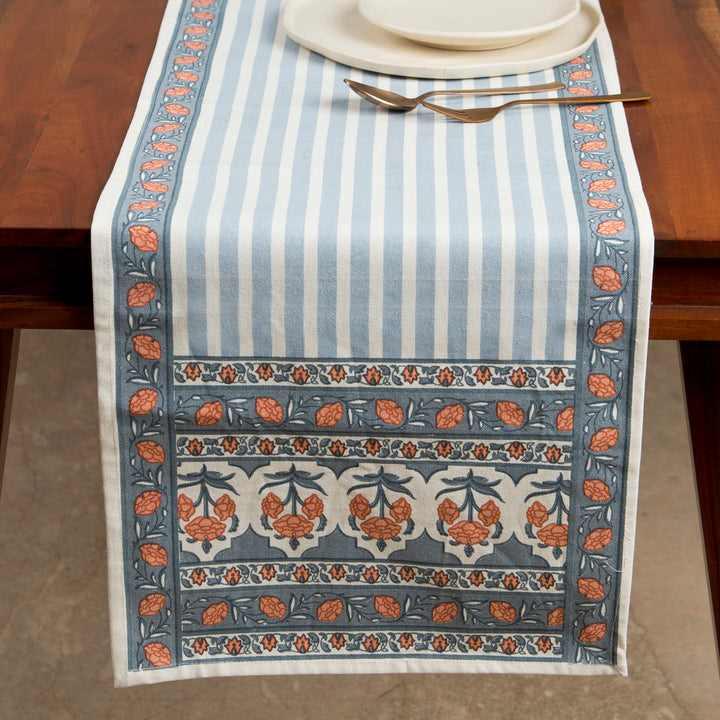 Printed cotton table runner in blue floral stripes
