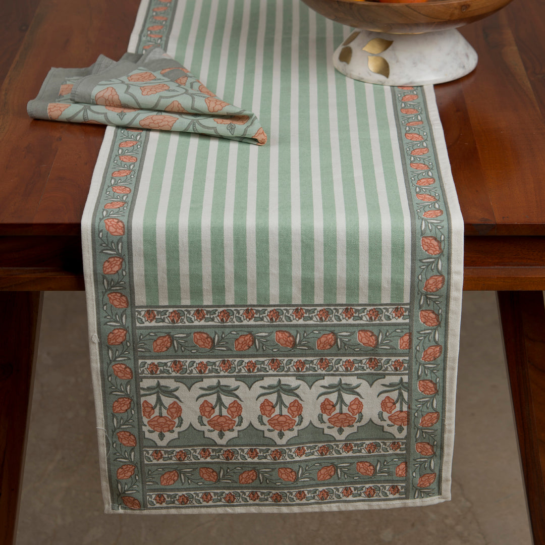 Gulshan table runner styled on dining table with plates and décor