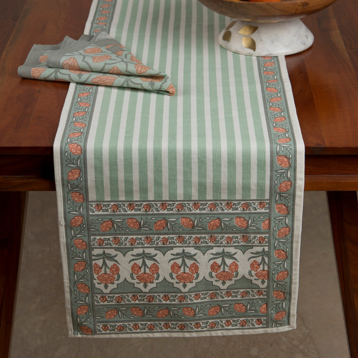 Gulshan table runner styled on dining table with plates and décor