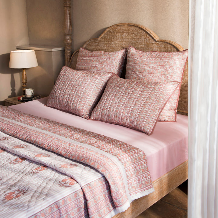 Kunj reversible cotton quilt in Blush Pink with floral and geometric patterns