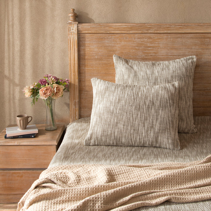 Earthy Brown cotton bed cover styled on bedroom setting with pillows and décor
