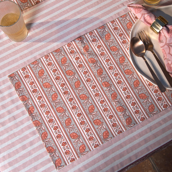 Gulshan table mats styled on dining table with plates and table décor
